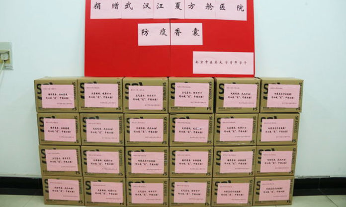 NUTCM Volunteer Students Make 2,000 Medicine Sachets for Wuhan
