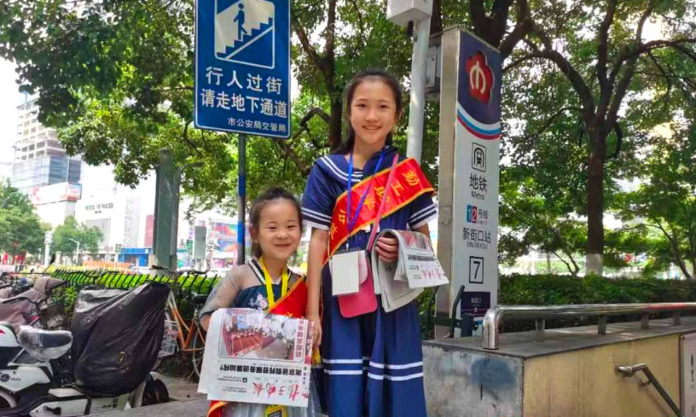 The Nanjinger - Joe Biden would be Proud of Girls Selling Newspapers in Nanjing