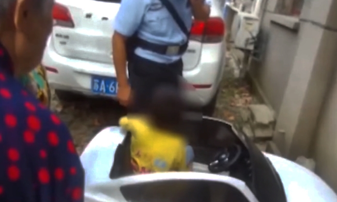 The Nanjinger - Nanjing Police Pull over Boy, 10, Driving Toy Car on Public Road