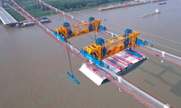 The Nanjinger - First Steel Box Girder Section Hoisted for New Yangtze River Bridge in Nanjing