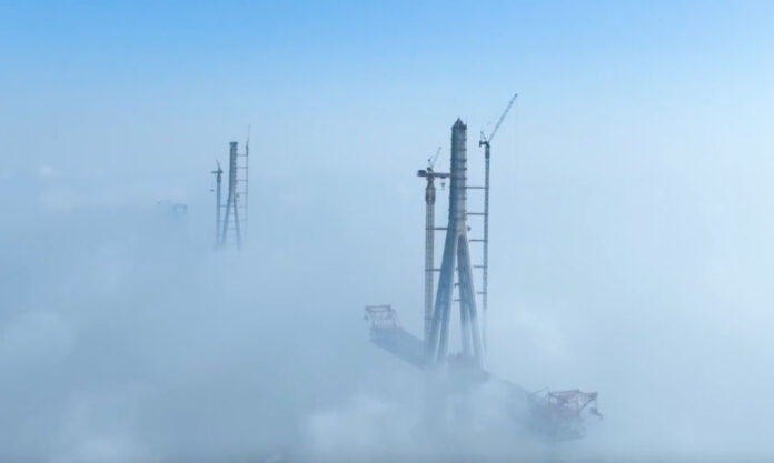 The Nanjinger - Breathtaking Sight of Changtai Yangtze River Bridge Piercing the Clouds