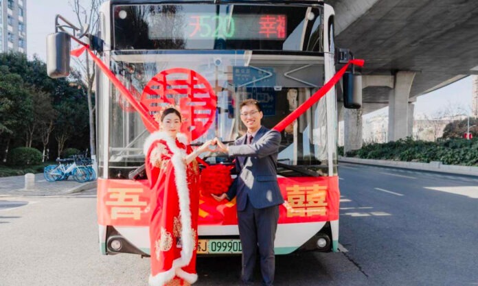 The Nanjinger - Couple in Yancheng Go Girl for their Renting Public Bus as Wedding Car