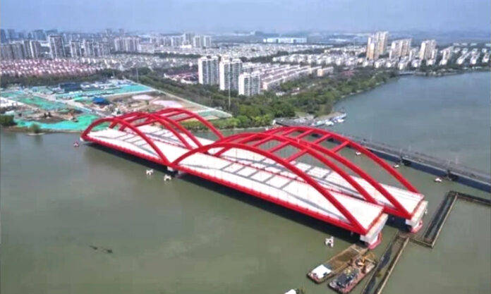 The Nanjinger - Embarrassment over Suzhou Bridge Standing alone in River & still Incomplete