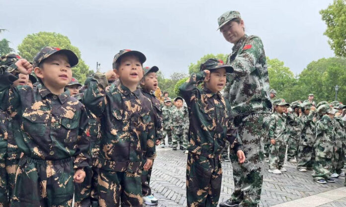 The Nanjinger - Military Training for 70 Changzhou Children in Kindergarten includes “Grenades”
