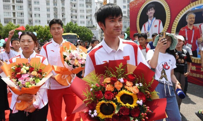 The Nanjinger - Triumphant Olympic Medal Winning Athletes Return to Nanjing from Paris